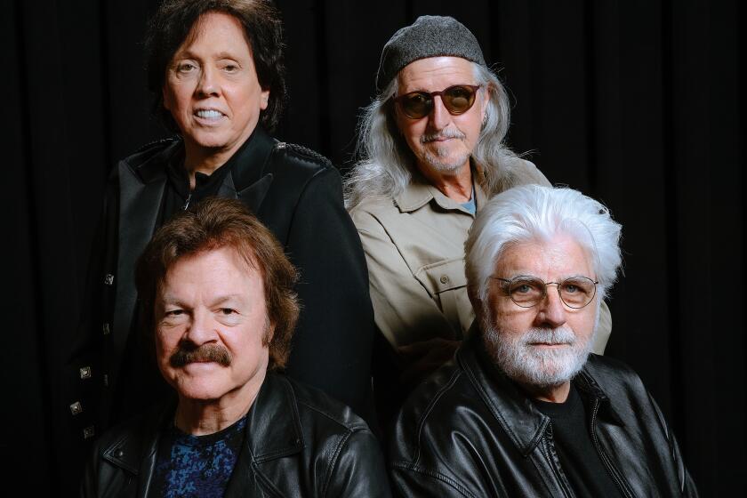 NORTH HOLLYWOOD, CA-APRIL 27, 2022: The rock band, The Doobie Brothers, clockwise from top left-John McFee, Patrick Simmons, Michael McDonald and Tom Johnston are photographed at Third Encore, a rehearsal studio in North Hollywood. The band is heading out soon on their reunion tour. (Mel Melcon / Los Angeles Times)