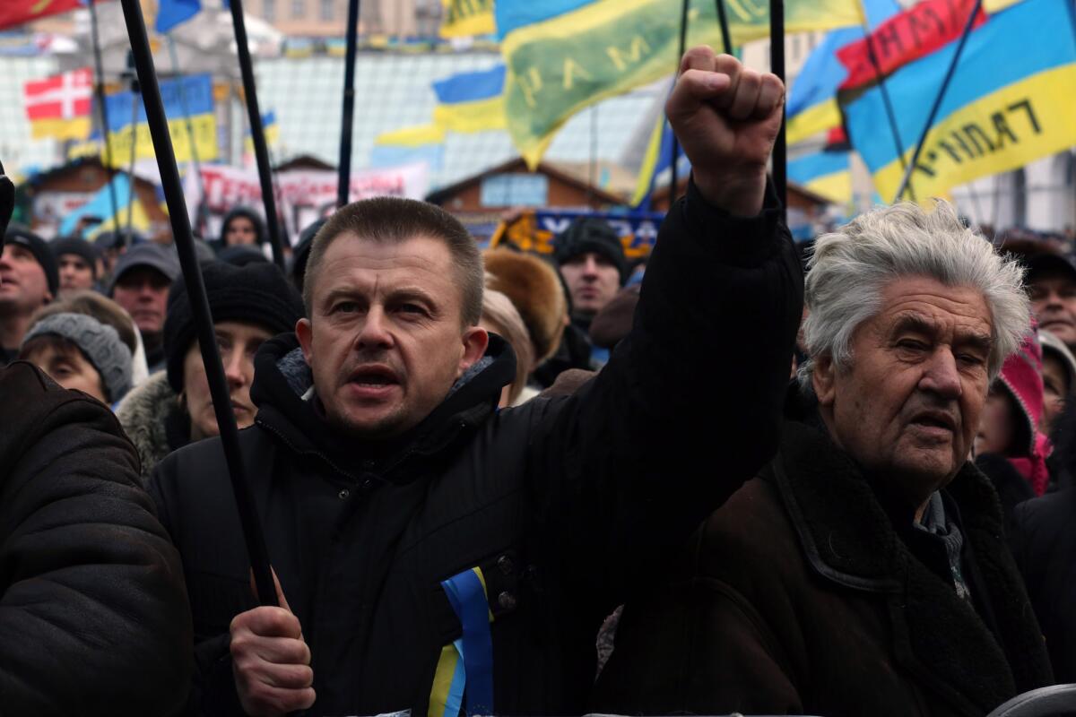 Ukrainian protesters gathered in Kiev's Independence Square on Friday demand the government's resignation.