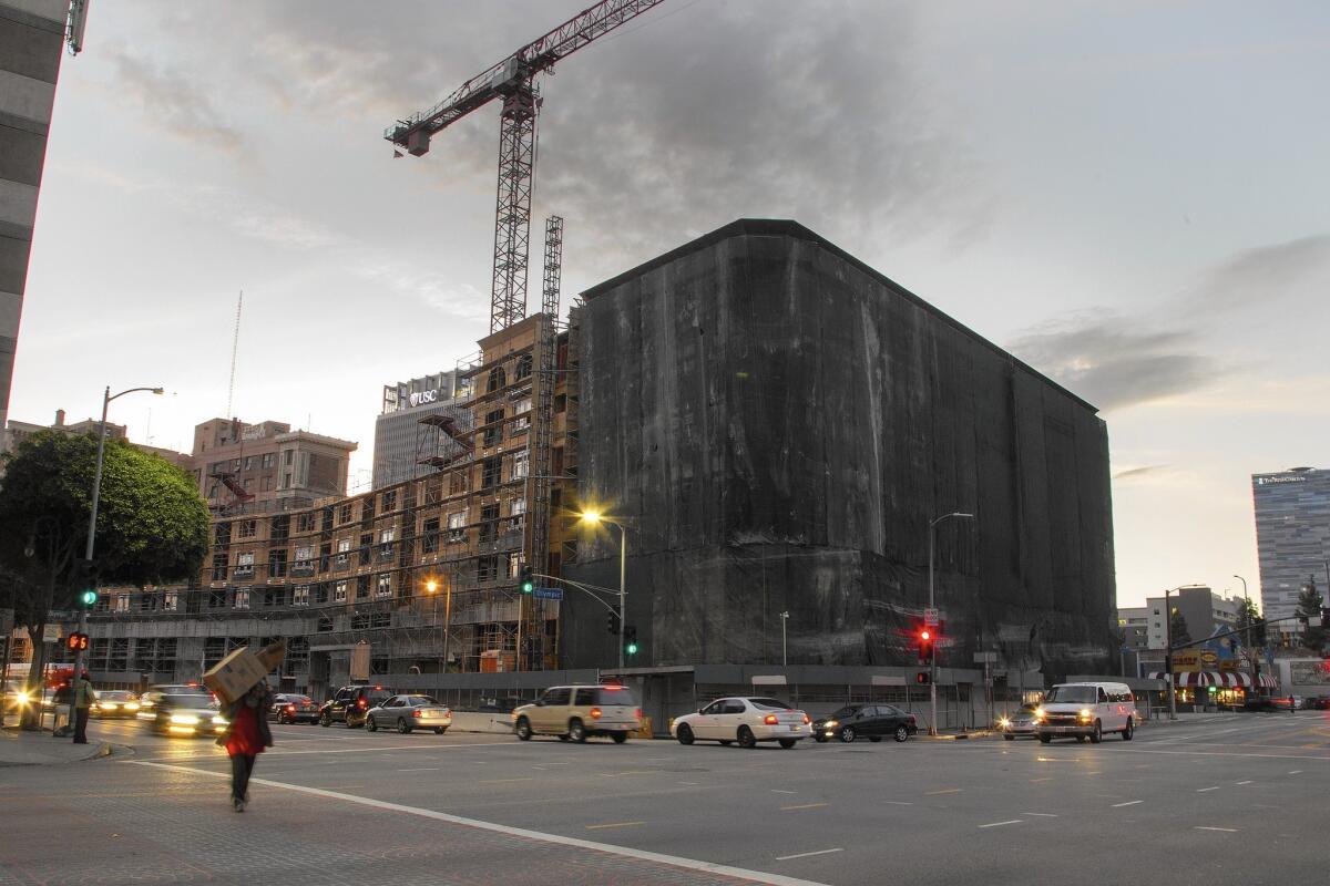 An apartment project under construction in downtown Los Angeles this year. On Tuesday, voters approved Measure JJJ, which imposes new affordable housing requirements on L.A. developments.