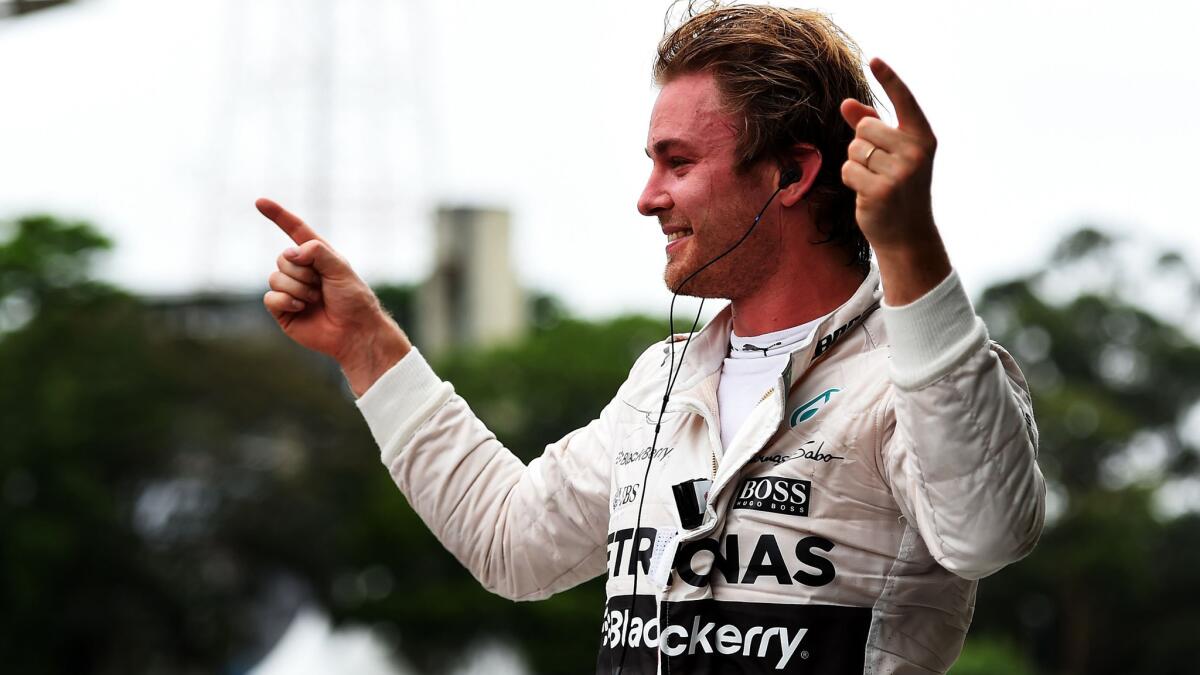 Formula One driver Nico Rosberg celebrates his victory at the Grand Prix of Brazil on Sunday.
