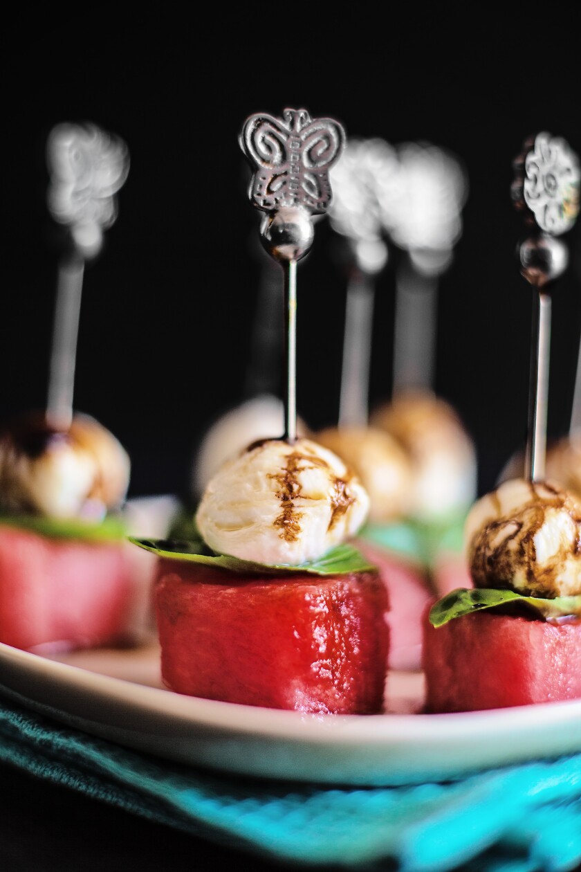 Watermelon, fresh mozzarella, basil and basalmic reduction appetizers.