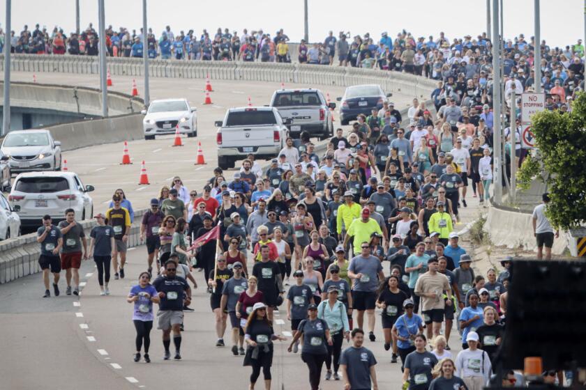 OTAY MESA MAY 19: Runners and walkers traverse the Coronado Bridge during the 37th Annual Bay Bridge Run/Walk on Sunday, Nat 19, 2024. The run/walk featured a 4-mile course from Downtown San Diego through Chicano Park and up and over the Coronado Bridge to Tidelands Park in Coronado. (Photo by Sandy Huffaker for The SD Union-Tribune)