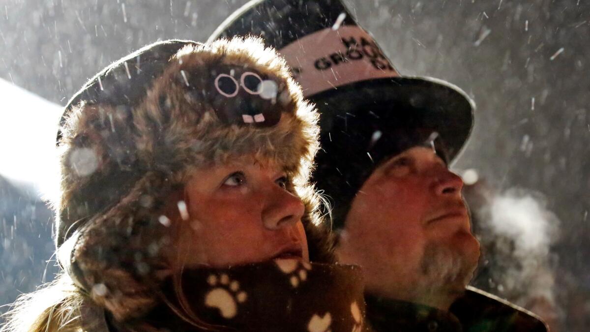 Jackie and Jimmy Wilson watch a fireworks display during on Gobbler's Knob on Friday.