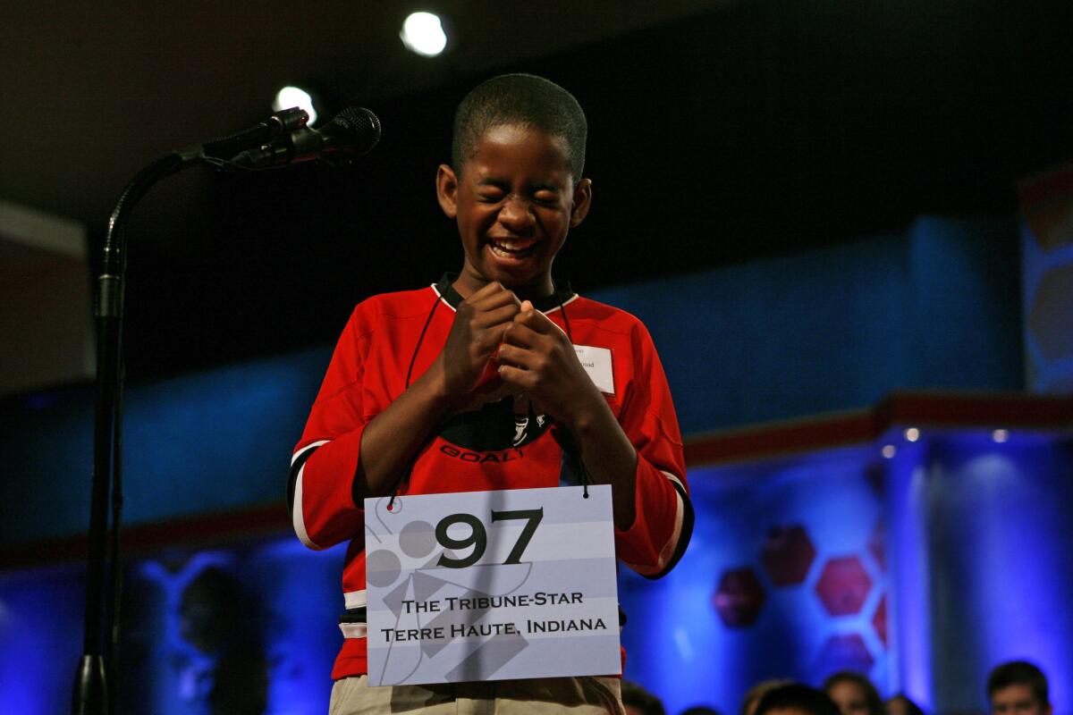 Kennyi Aouad, 11, of Terre Haute, Ind., bursts into laughter when asked to spell the word "sardoodledom" in Round 3 of the 2007 Scripps National Spelling Bee in Washington. This year a vocabulary test has been added to the competition.