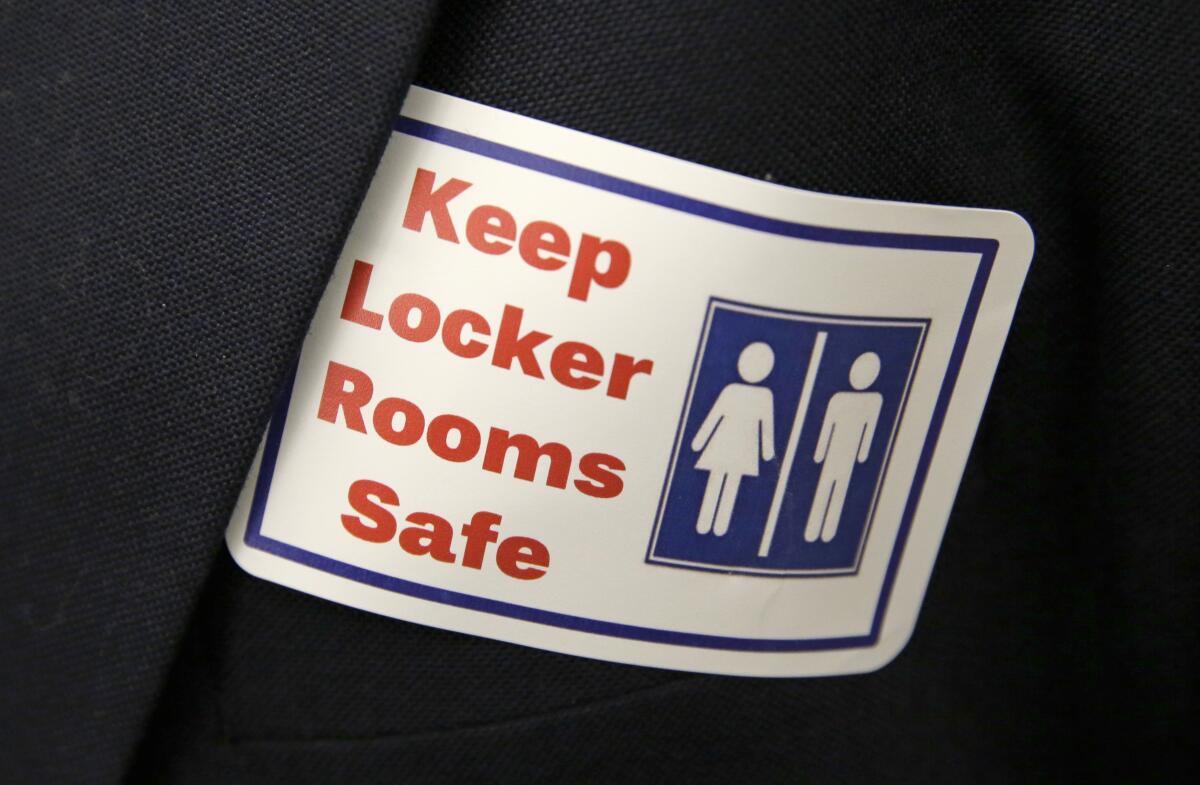 Sticker that reads, "Keep Locker Rooms Safe"