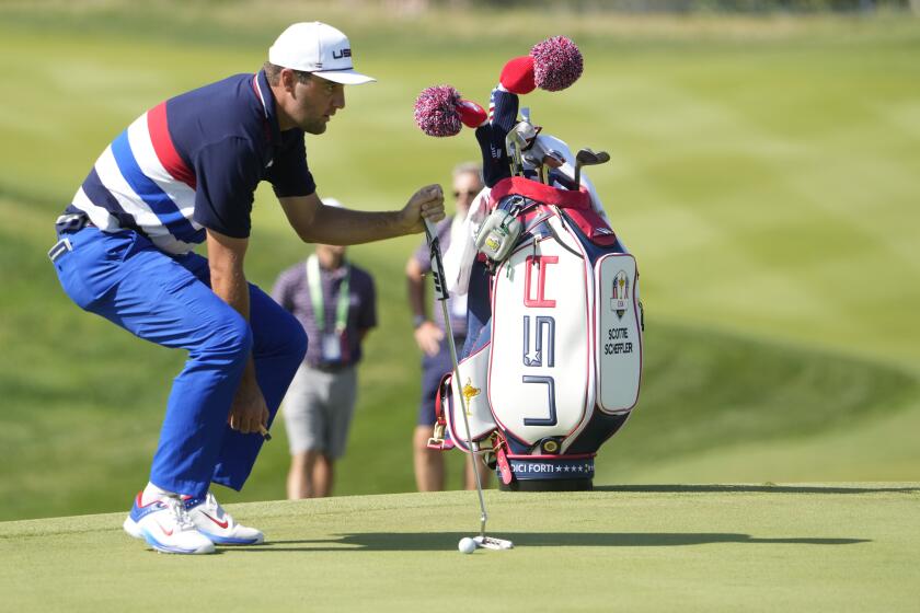 United States' Scottie Scheffler look at his putt on the 3rd green during a practice round ahead of the Ryder Cup at the Marco Simone Golf Club in Guidonia Montecelio, Italy, Wednesday, Sept. 27, 2023. The Ryder Cup starts Sept. 29, at the Marco Simone Golf Club. (AP Photo/Andrew Medichini)