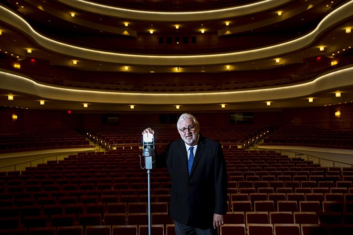 Dean Corey, former artistic director of the Philharmonic Society of Orange County, at Segerstrom Concert Hall in Costa Mesa. The organization reports that it ramped up spending and donations to mark his recent final season with special offerings.