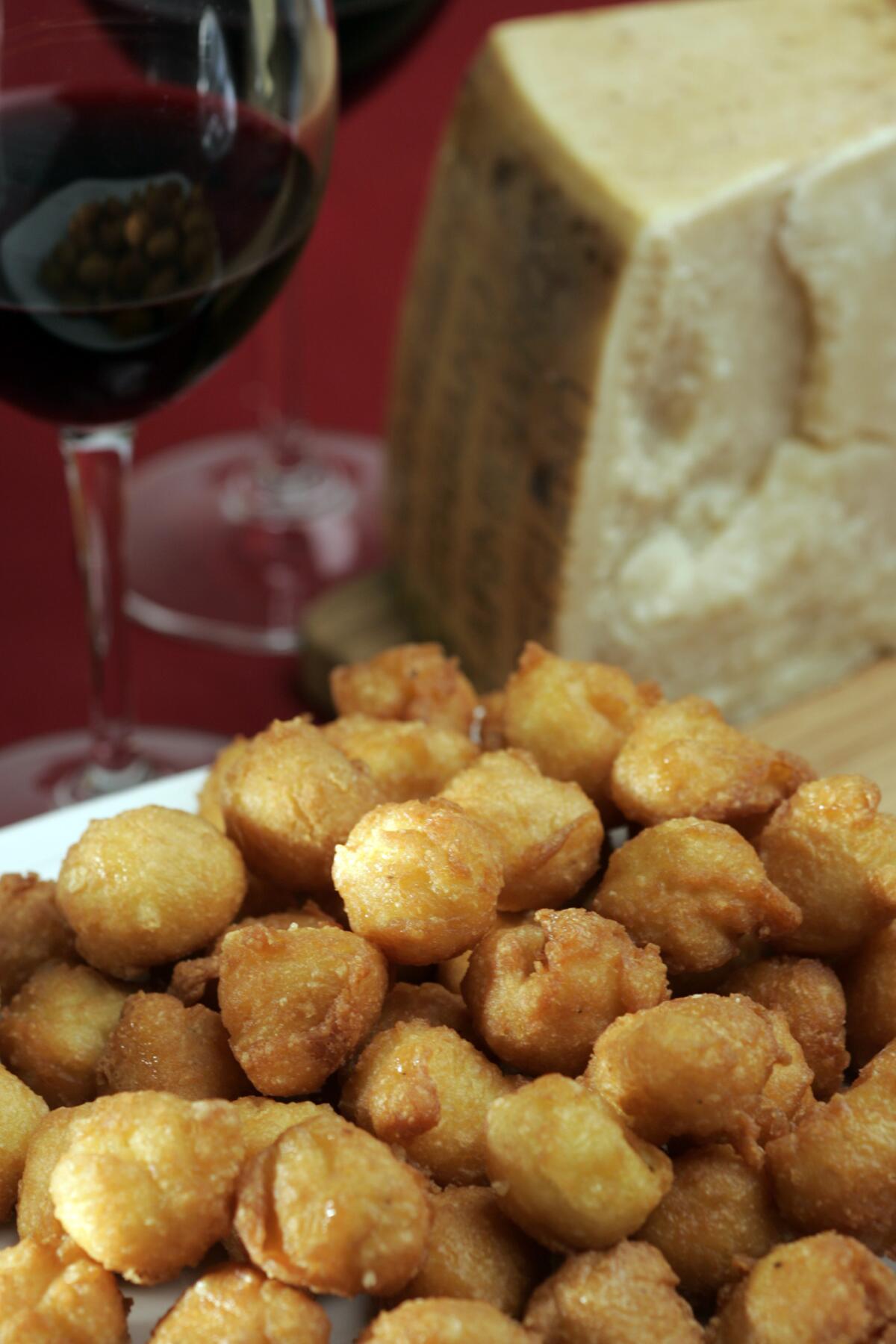 Osman, Stephen -- - Cheese Beignets, platter.