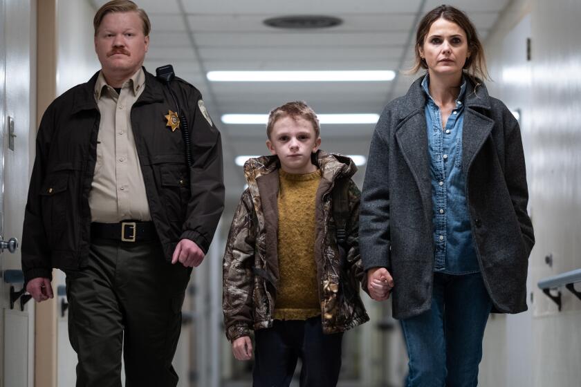 Jesse Plemmons, left, Jeremy T. Thomas and Keri Russell in “Antlers”