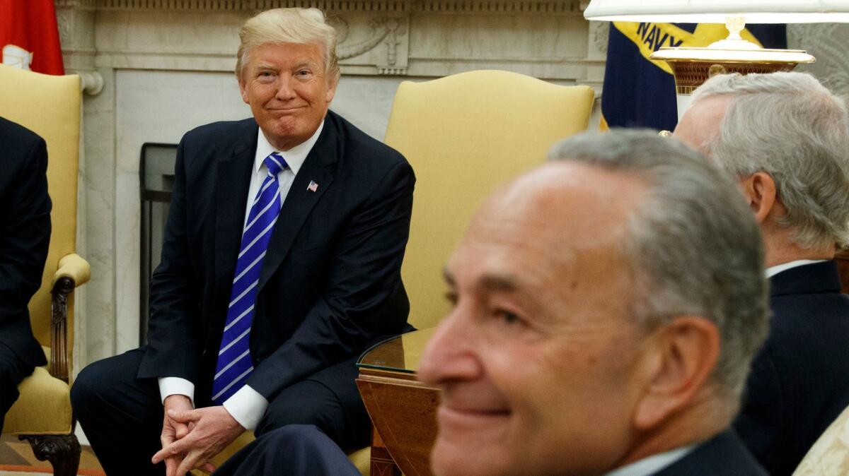 President Trump meets with Senate Minority Leader Charles E. Schumer (D-N.Y.) in the Oval Office on Sept. 6.