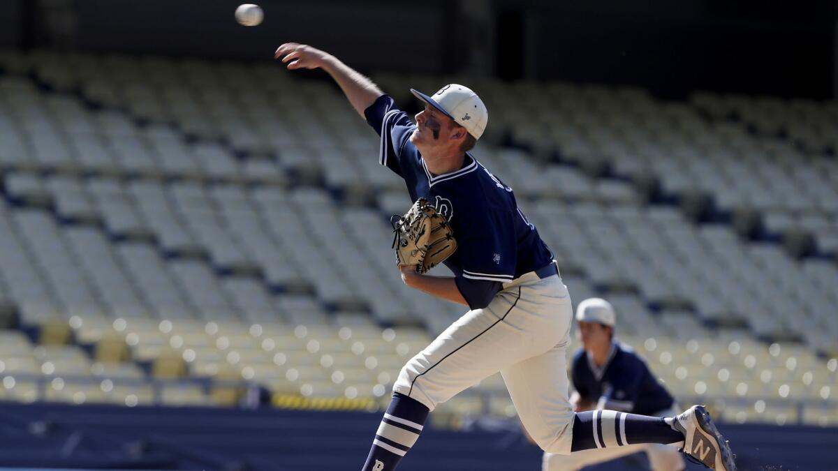 Birmingham reliever DJ Vergini delivers a pitch against the El Camino Real Conquistadores in the seventh inning of the City Section Open Division baseball final at Dodger Stadium.