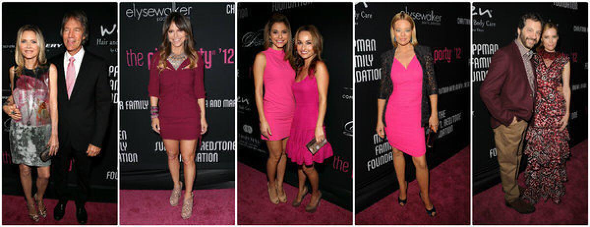 Attendees at Elyse Walker's 8th annual Pink Party included, from left, host Michelle Pfeiffer and husband David E. Kelley, Elyse Walker, Maria Menounos and Giada de Laurentiis, Jeri Ryan, Judd Apatow and wife Leslie Mann