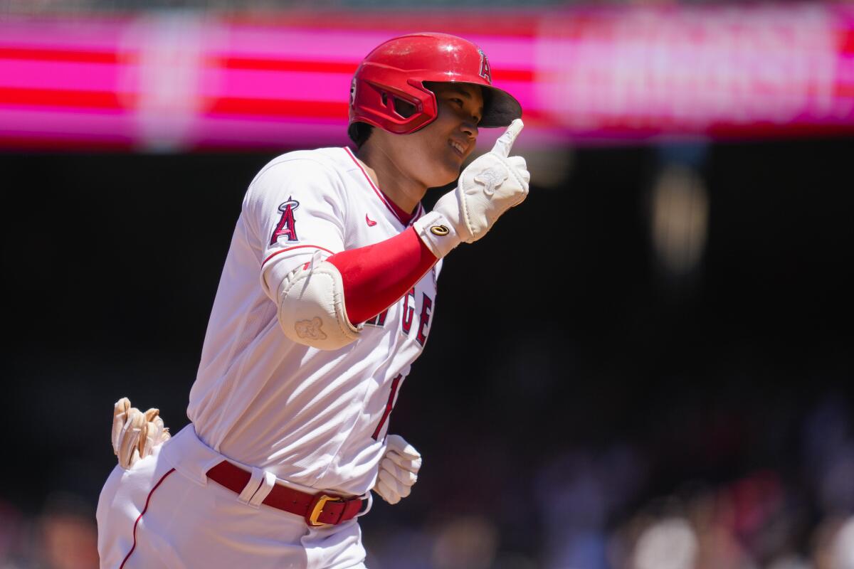 Shohei  Ohtani runs the bases after hitting a home run against the Orioles at Angel Stadium.