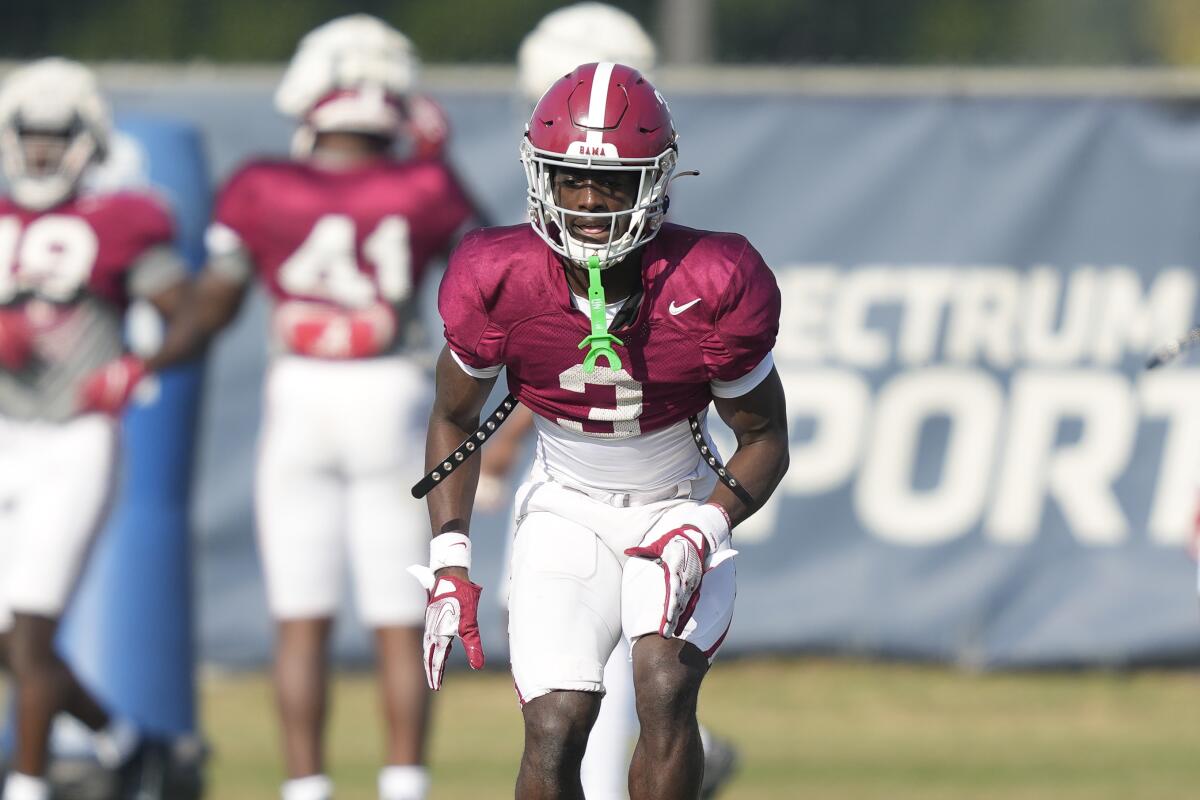 Alabama defensive back Terrion Arnold (3) warms up before a game.