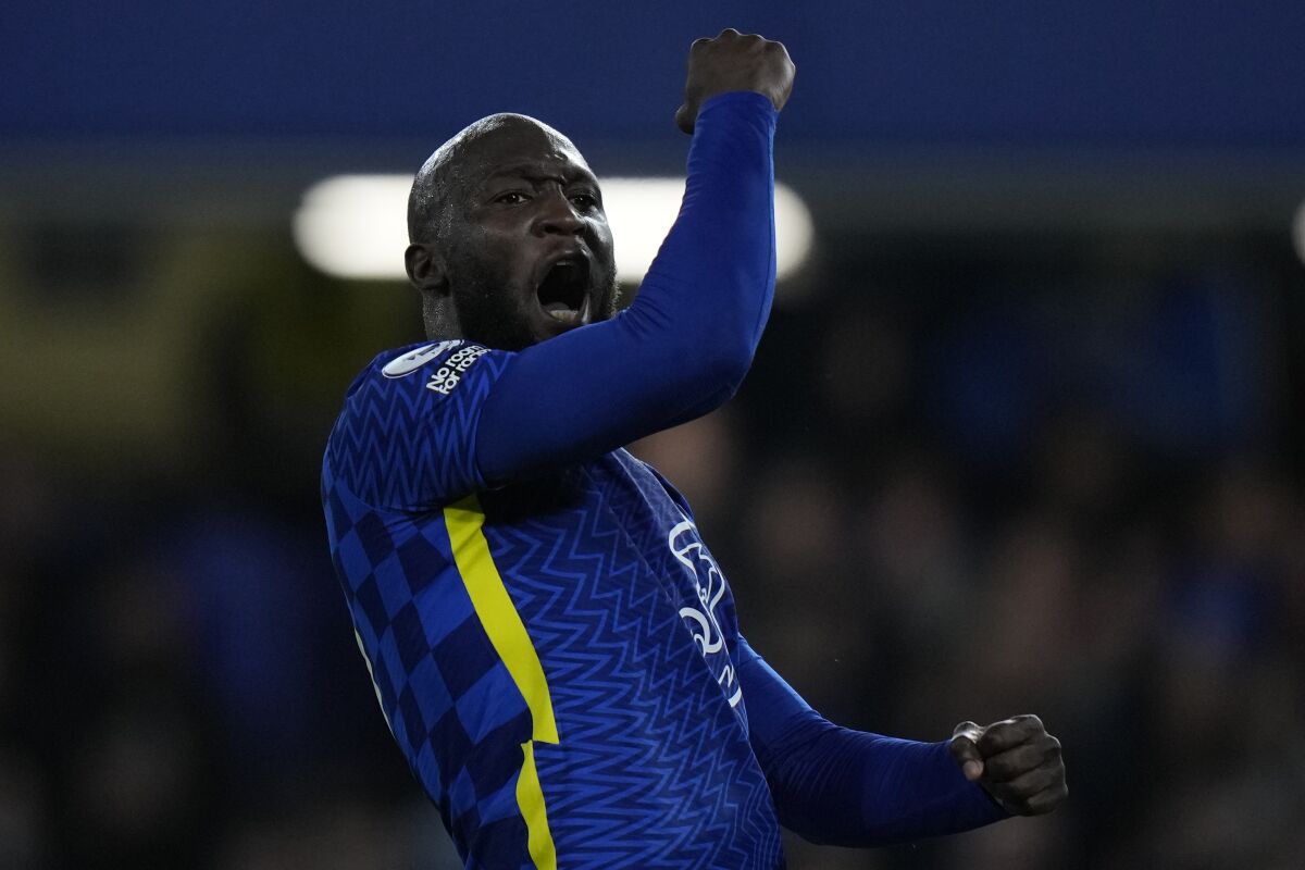 Chelsea's Romelu Lukaku celebrates after scoring his side's opening goal during the English Premier League soccer match between Chelsea and Brighton at Stamford Bridge Stadium in London, England, Wednesday, Dec. 29, 2021. (AP Photo/Alastair Grant)