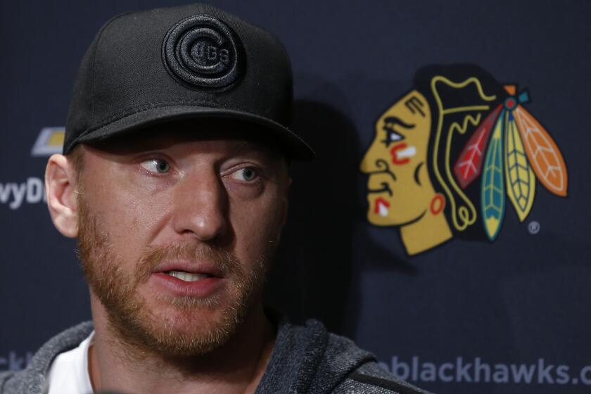 The Blackhawks' Marian Hossa answers a question at their end-of-season media availability at the United Center on April 22, 2017.