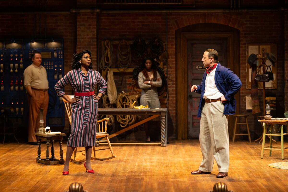 Four people stand onstage looking sternly at each other in the Old Globe's "Trouble in Mind."