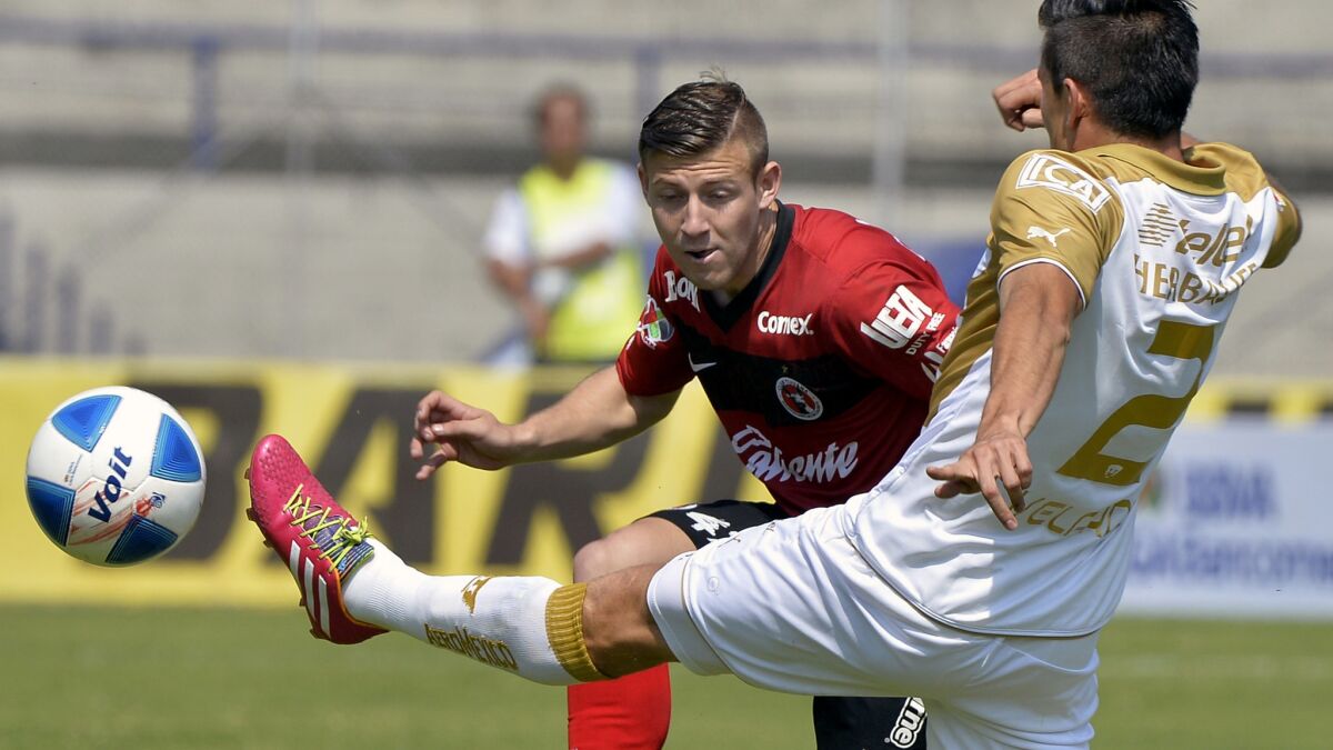 Paul Arriola, shown playing for Mexican club Tijuana, had a successful debut with the U.S. national team on Sunday.