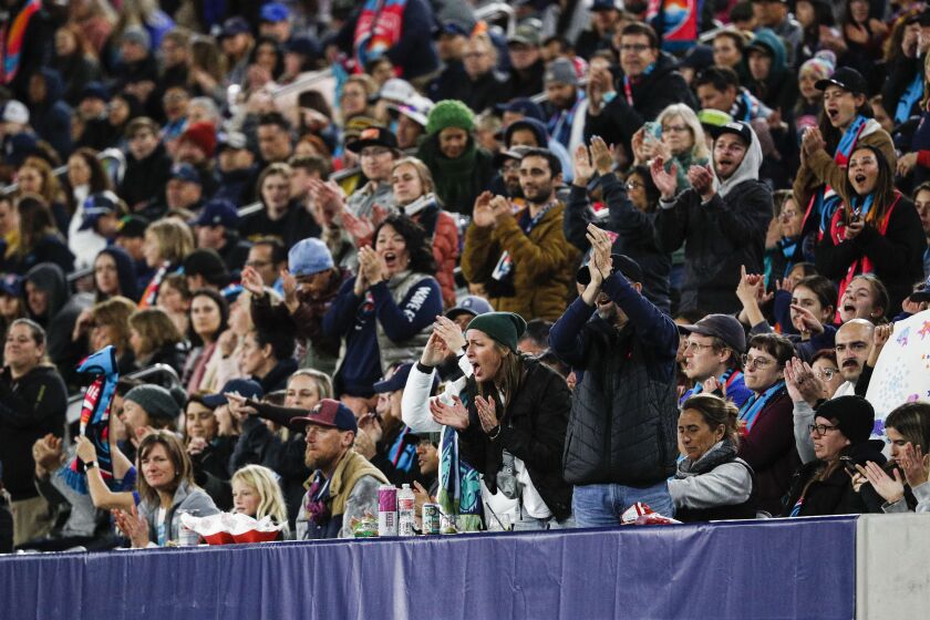 Fans cheer on the San Diego Wave during the season opener against the Chicago Red Stars at Snapdragon Stadium on Saturday, March 25, 2023. Saturday's game's attendance was 30,854, setting an NWSL opening day record.