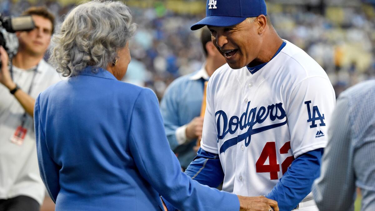 Dodgers Manager Dave Roberts greets Rachel Robinson during a pregame ceremony on Jackie Robinson Day.