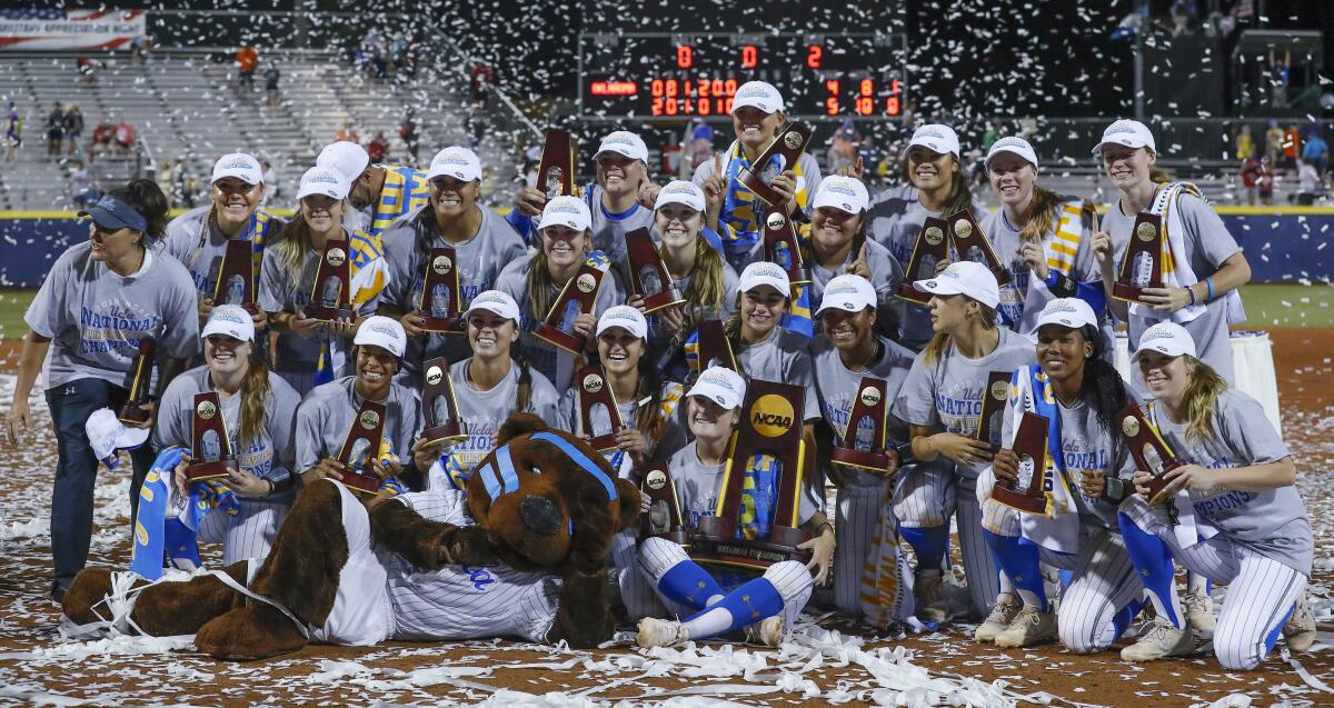 The UCLA softball team poses for a photo after the Bruins beat Oklahoma to win the 2019 NCAA title in Oklahoma City.
