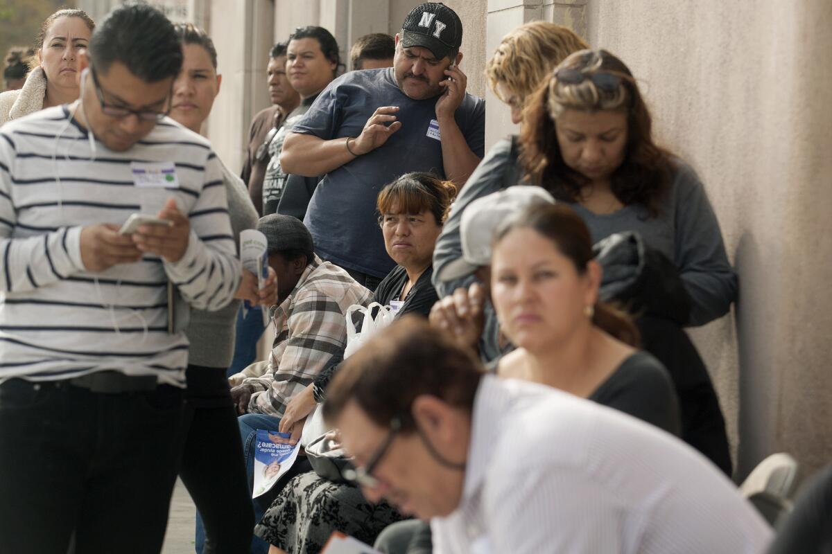 Los Angeles residents wait in line to sign up for Obamacare coverage in November. But will they get in to see a doctor?