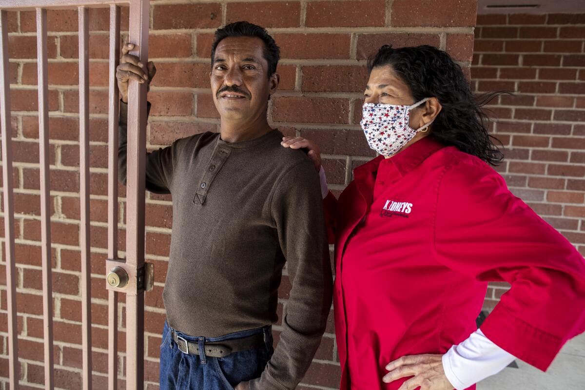 Dialysis patient Miguel Rangel, left, and Carolyn Lemos-Urquidez, president of Kidneys Quest Foundation,