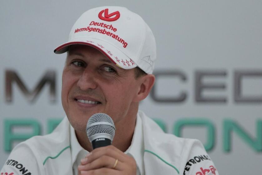 Doctors have begun trying to remove Michael Schumacher, shown in 2012, from his medically induced coma.
