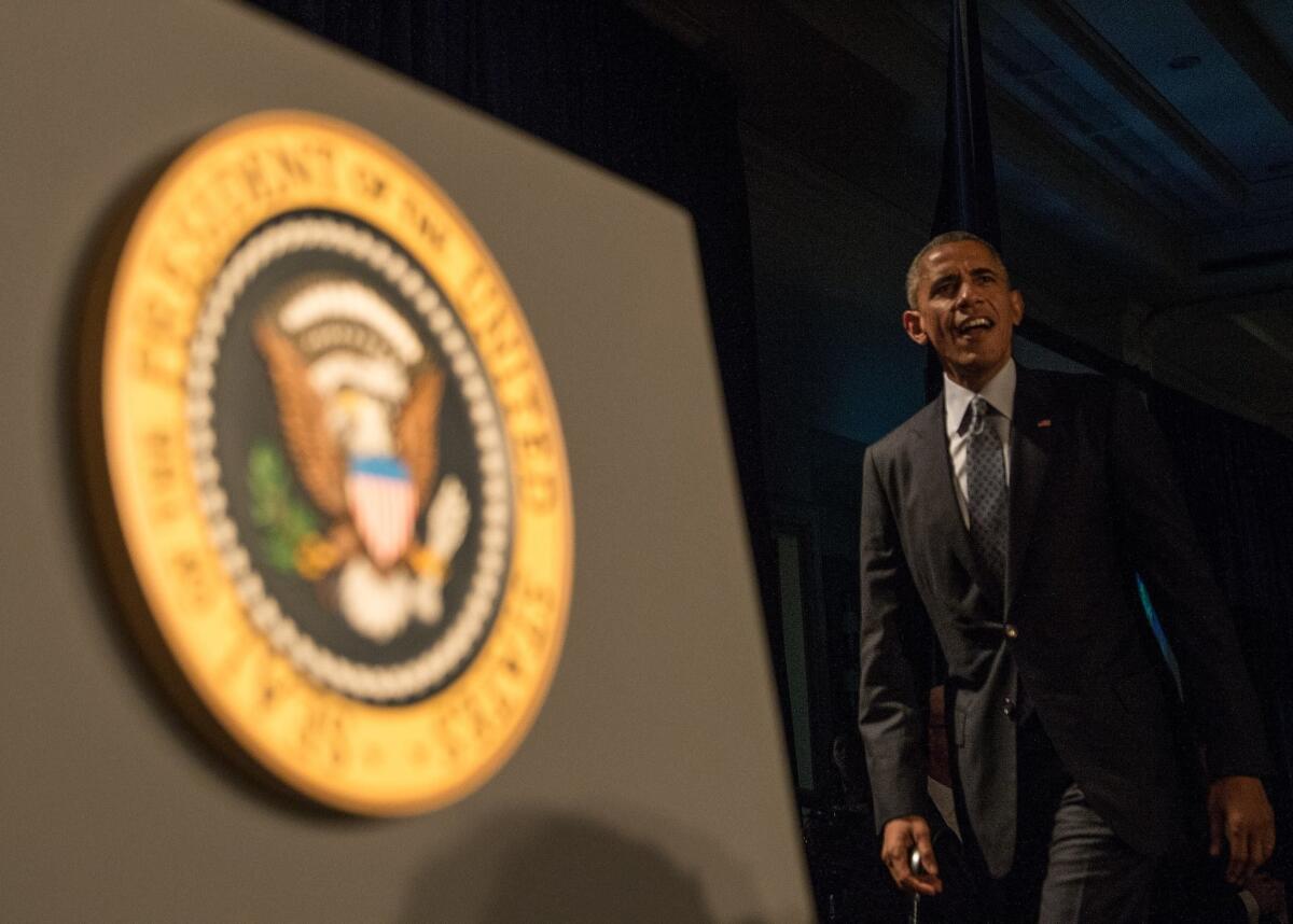 President Obama arrives to address the House Democratic Caucus retreat in Philadelphia.