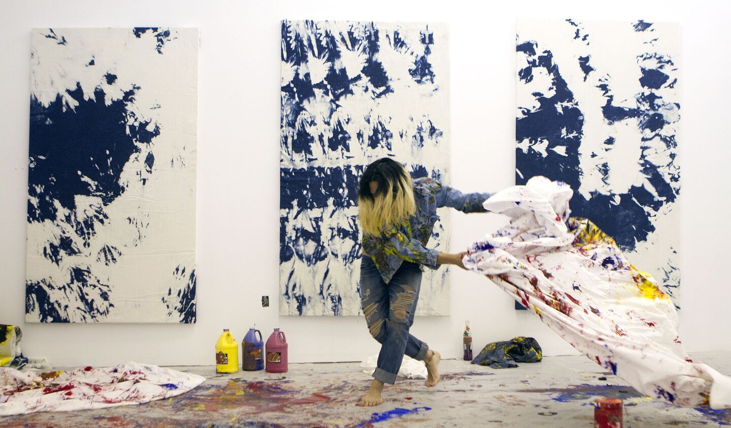 Bangkok, Thailand-raised, New York-based artist Korakrit Arunanondchai works on his exhibition at the Mistake Room, a nonprofit exhibition space in downtown Los Angeles.