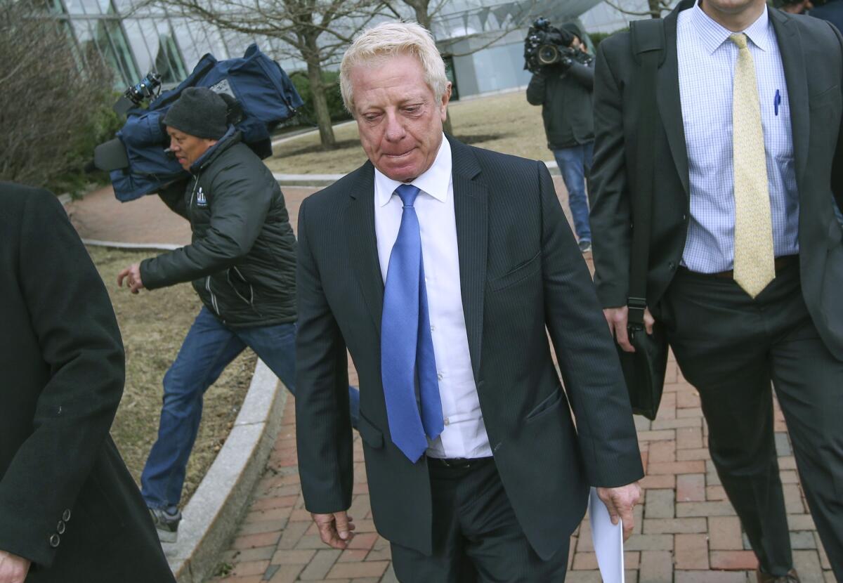 A man leaving a courthouse