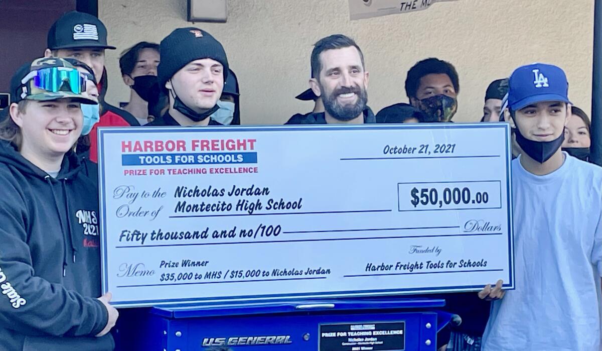 Montecito High students congratulate Nicholas Jordan for his Harbor Freight Tools for Schools prize.