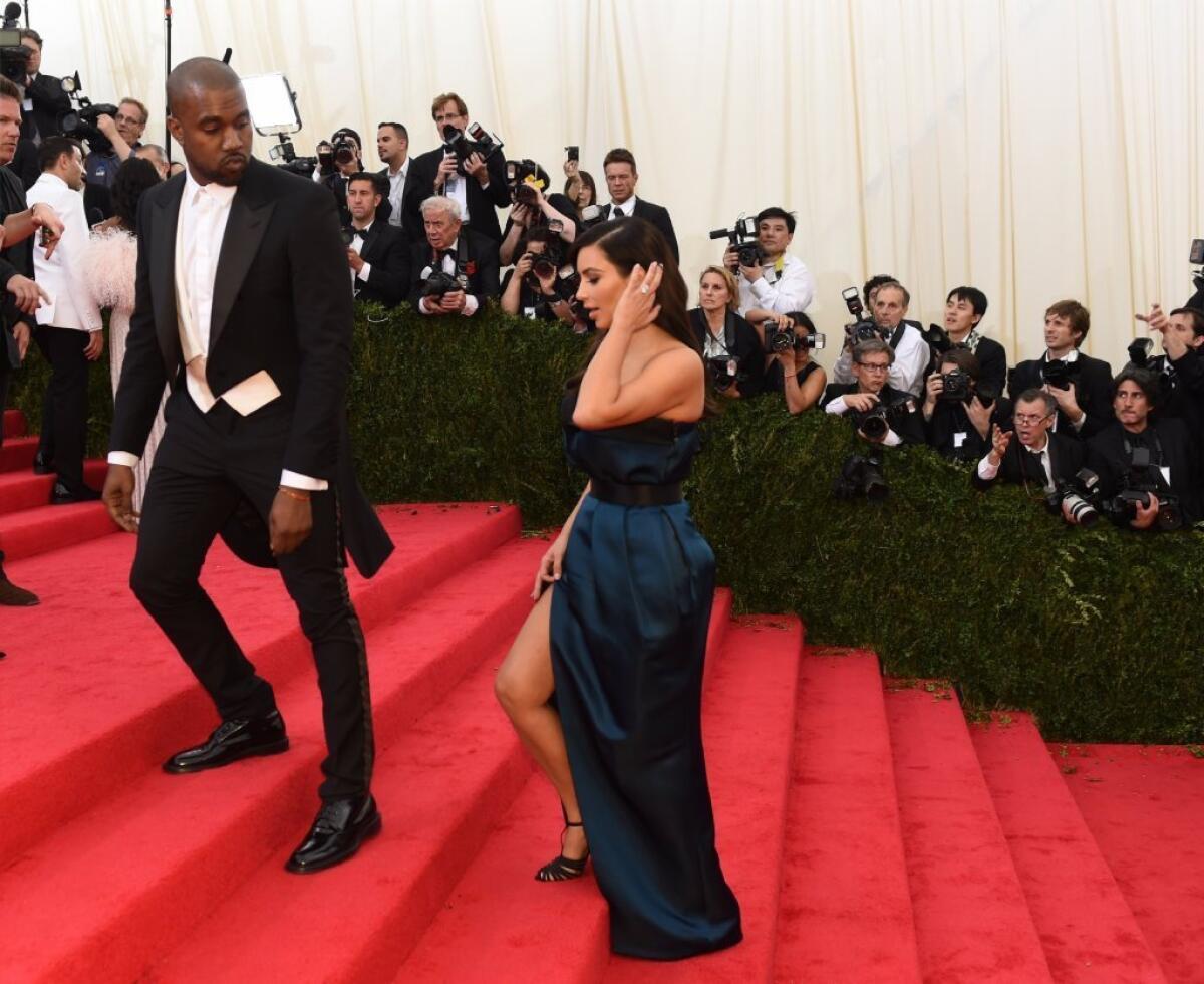 Kanye West and Kim Kardashian, both in Lanvin, arrive at the Metropolitan Museum of Art's Costume Institute Gala on Monday night.