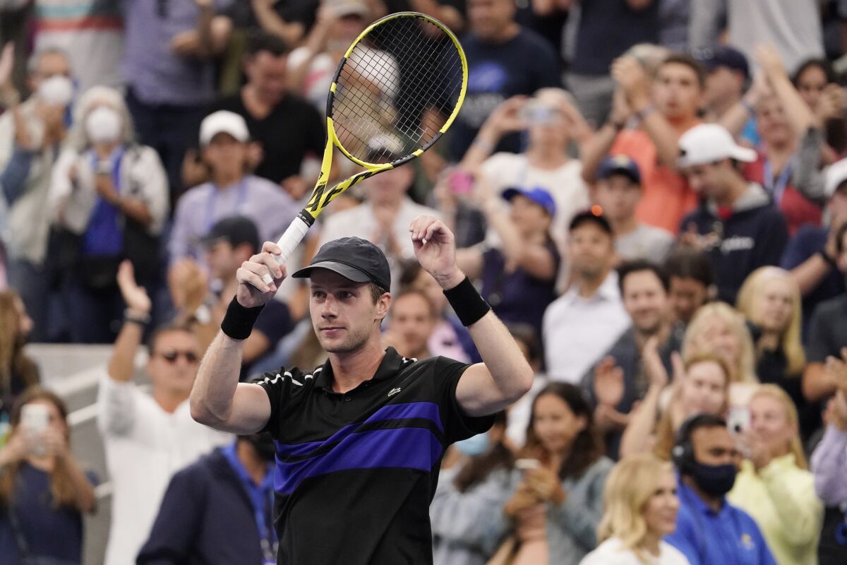 Botic Van de Zandschulp, of the Netherlands, reacts after defeating Diego Schwartzman, of Argentina, during the fourth round of the US Open tennis championships, Sunday, Sept. 5, 2021, in New York. (AP Photo/John Minchillo)