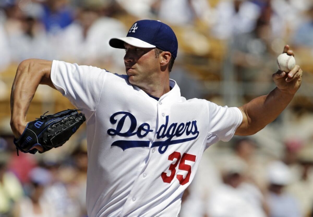 Will Chris Capuano, above, replace the injured Zack Greinke in the Dodgers' pitching rotation?