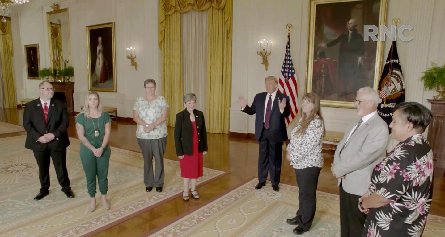 President Trump speaks with front-line workers.