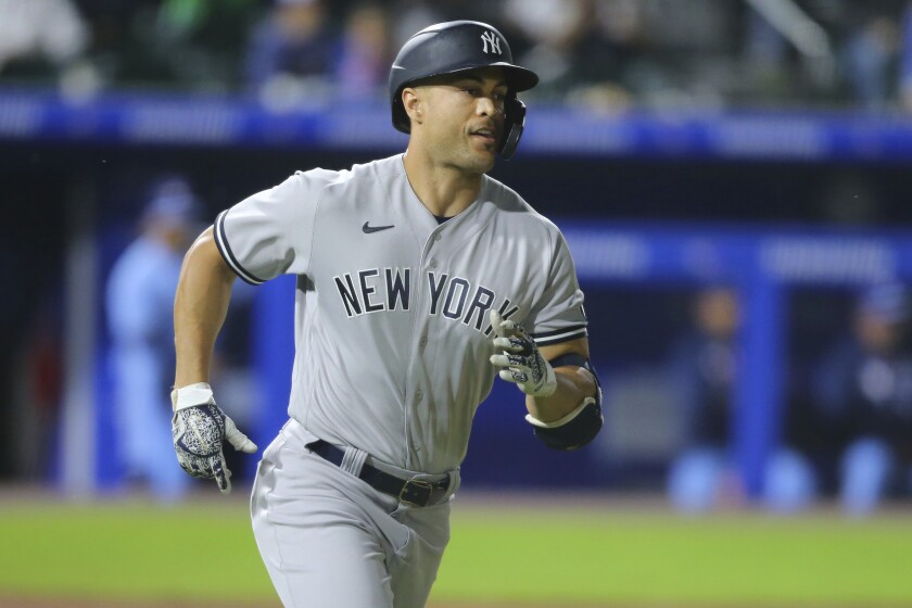 New York Yankees' Giancarlo Stanton runs after hitting a two-run home run off Toronto Blue Jays pitcher Anthony Castro during the seventh inning of a baseball game, Thursday, June 17, 2021, in Buffalo, N.Y. (AP Photo/Jeffrey T. Barnes)