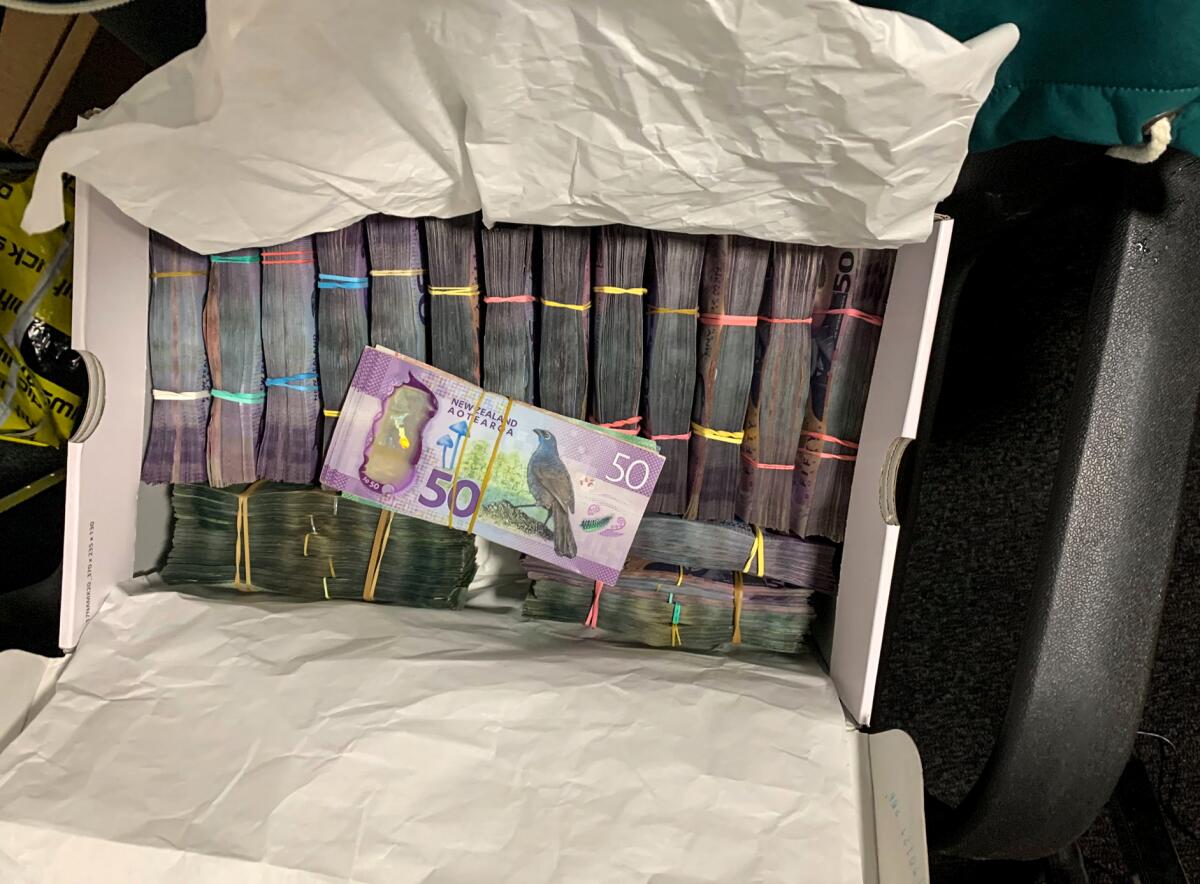 a box containing a large amounts of cash