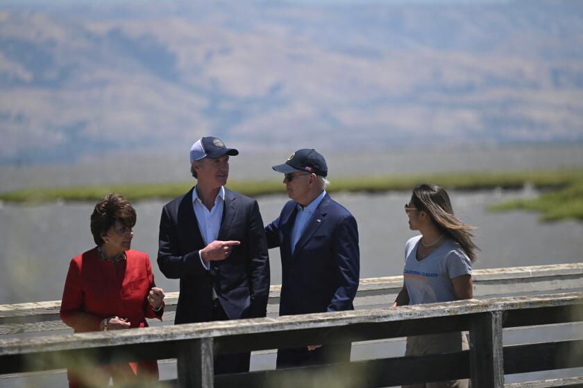 US President Joe Biden (2nd R) speaks with California Governor Gavin Newsom (2nd L), Democartic Representative from California Anna Eshoo (L) and environmental student Chiena Ty before delivering remarks at the Lucy Evans Baylands Nature Interpretive Center and Preserve in Palo Alto, California, on June 19, 2023. (Photo by ANDREW CABALLERO-REYNOLDS / AFP) (Photo by ANDREW CABALLERO-REYNOLDS/AFP via Getty Images)