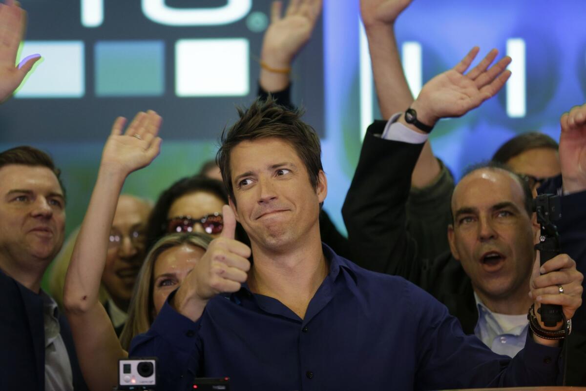 GoPro Chief Executive Nick Woodman celebrates his company's IPO with at Nasdaq in June.