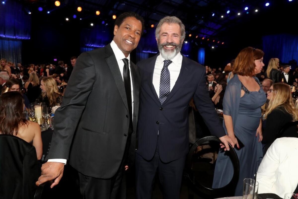 Denzel Washington, left, and Mel Gibson at the Critics Choice Awards.