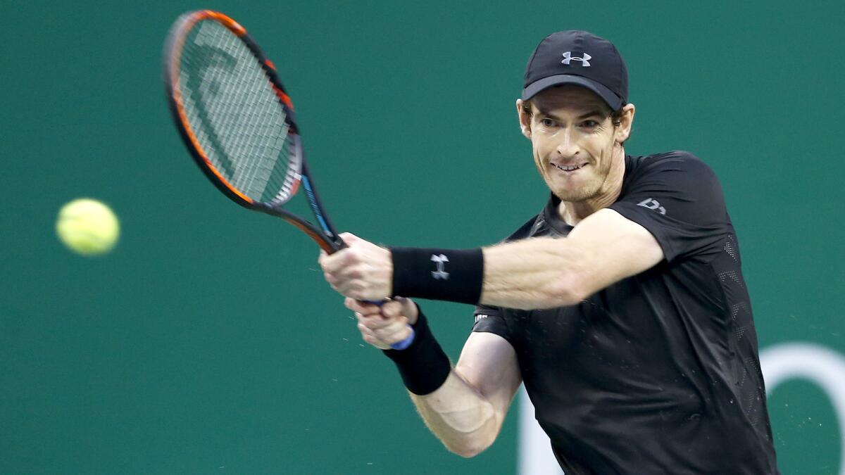 Andy Murray returns a shot against Roberto Bautista Agut during the championship match of the Shanghai Masters on Sunday.