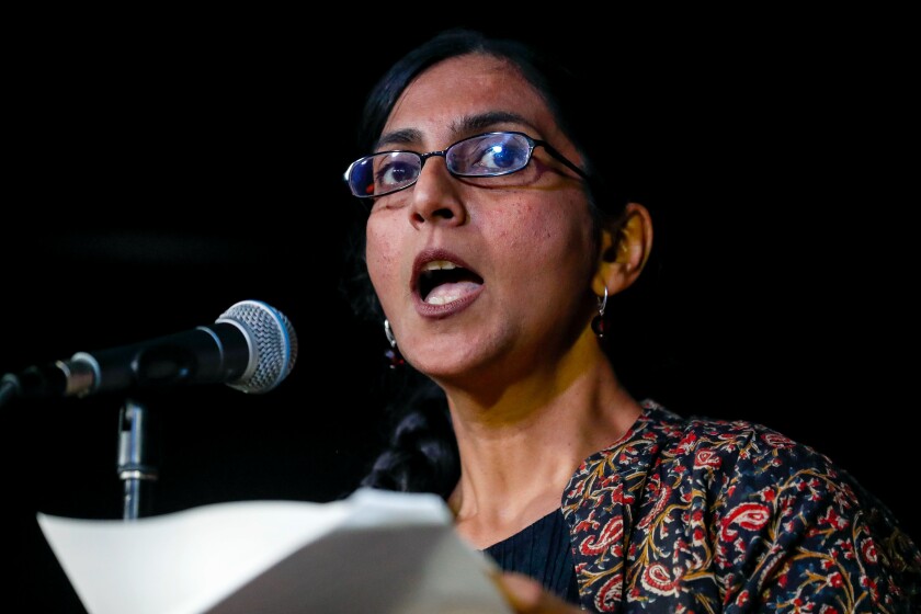 Seattle Councilmember Kshama Sawant speaks to supporters Tuesday, Dec. 7, 2021, in Seattle. Preliminary results show voters in Seattle narrowly in favor of recalling Sawant. (Jennifer Buchanan/The Seattle Times via AP)