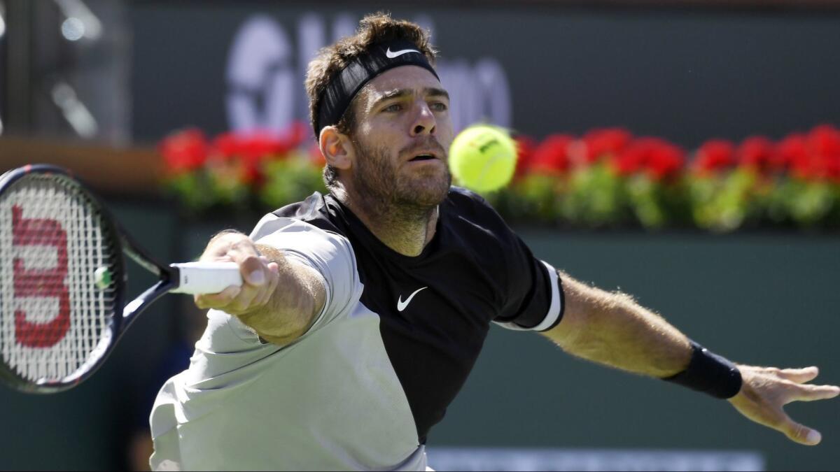 Juan Martin del Potro returns a shot to Roger Federer during the men's final at the BNP Paribas Open in March 2018.