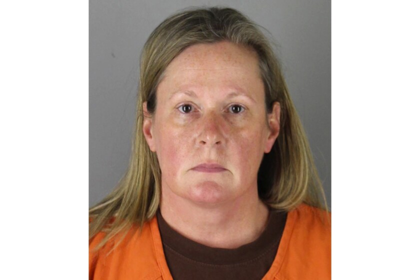 FILE - This booking photo released by the Hennepin County, Minn., Sheriff shows Kim Potter, a former Brooklyn Center, Minn., police officer. A Minnesota judge on Tuesday, May 11, 2021, denied media requests to allow cameras at an upcoming hearing for Potter, the former suburban Minneapolis police officer charged in Daunte Wright's death. (Hennepin County Sheriff via AP, File)