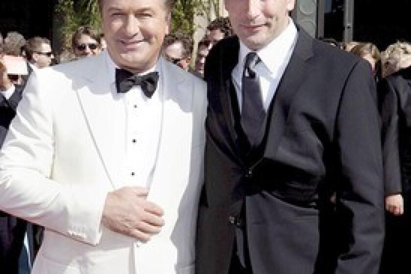 With brother Alec Baldwin (left) at Primetime Emmy Awards.