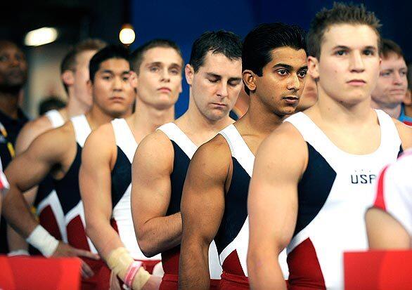 U.S. gymnasts put their game faces on before the start of the team qualifying competition in the 2008 Beijing Olympics on Saturday.
