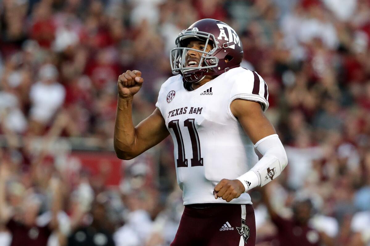 Texas A&M quarterback Kellen Mond celebrates a touchdown Oct. 13, 2018.