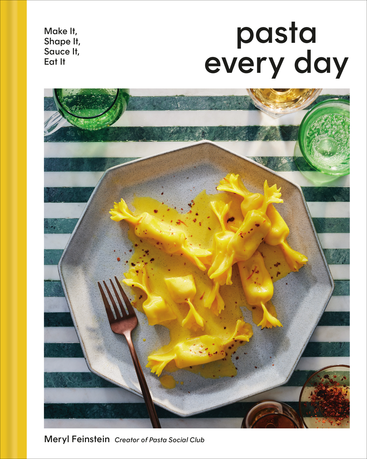 The cover of Pasta Every Day cookbook: A dish of yellow pinched pasta on a ceramic plate atop green and white stripes