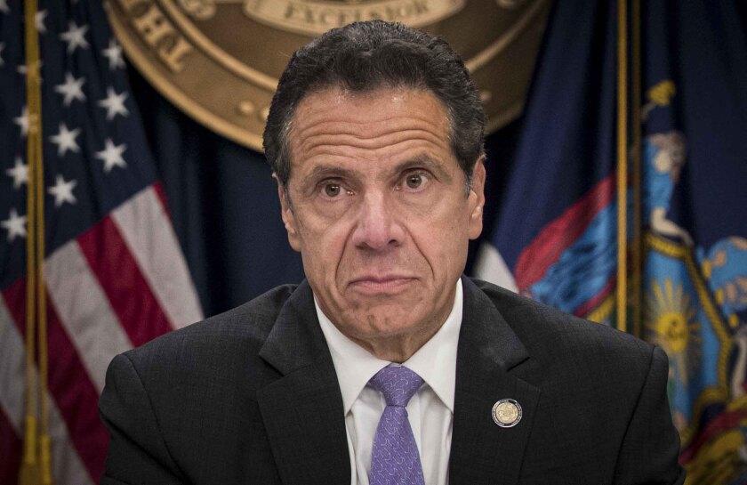 FILE - In this Sept. 14, 2018 file photo, Gov. Andrew Cuomo listens during a news conference in New York. Gov. Andrew Cuomo is expected to be interviewed by investigators with the state attorney general’s office who are looking into sexual harassment allegations as the probe nears its conclusion. The timing of the interview Saturday, July 17, 2021 in Albany was confirmed by two people familiar with the case who spoke to The Associated Press on condition of anonymity. (AP Photo/Mary Altaffer, File)